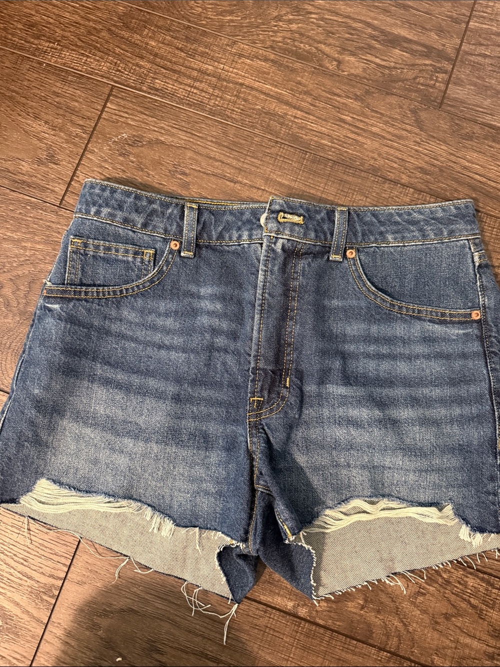 Fabletics Medium Blue Denim Cutoff Shorts with Raw Hem